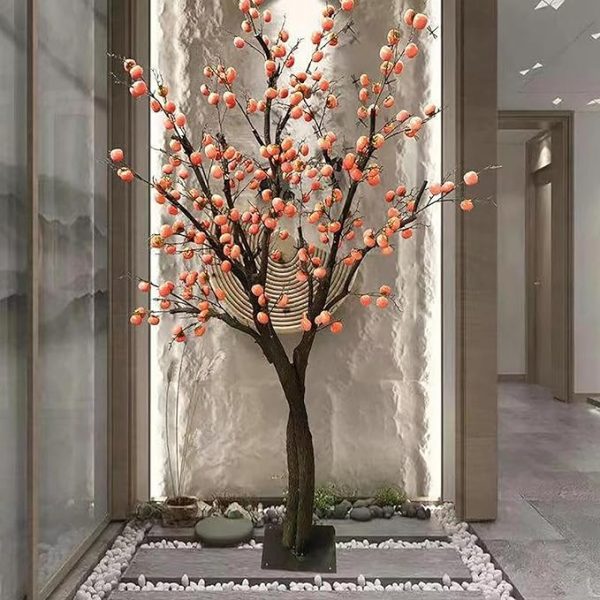 Lifelike faux fruit tree for commercial space