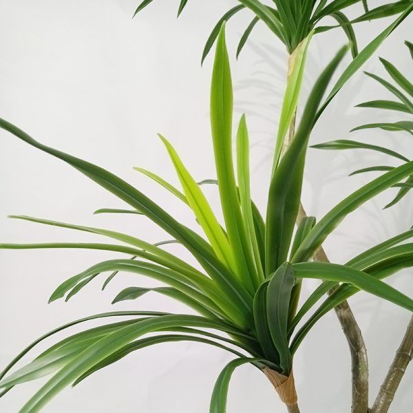 Faux tropical plant in pot for commercial interior
