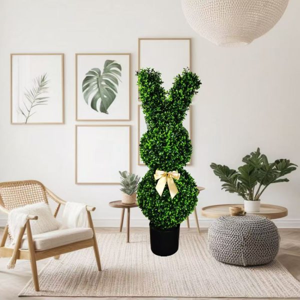 Whimsical indoor topiary plant for retail decor