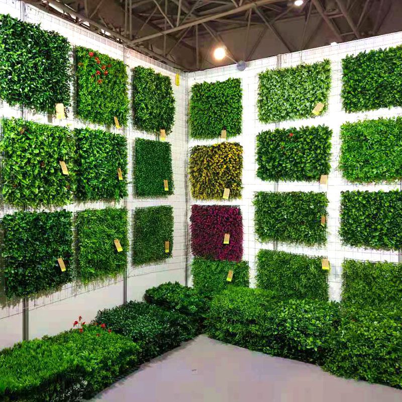 Artificial green fence for commercial spaces
